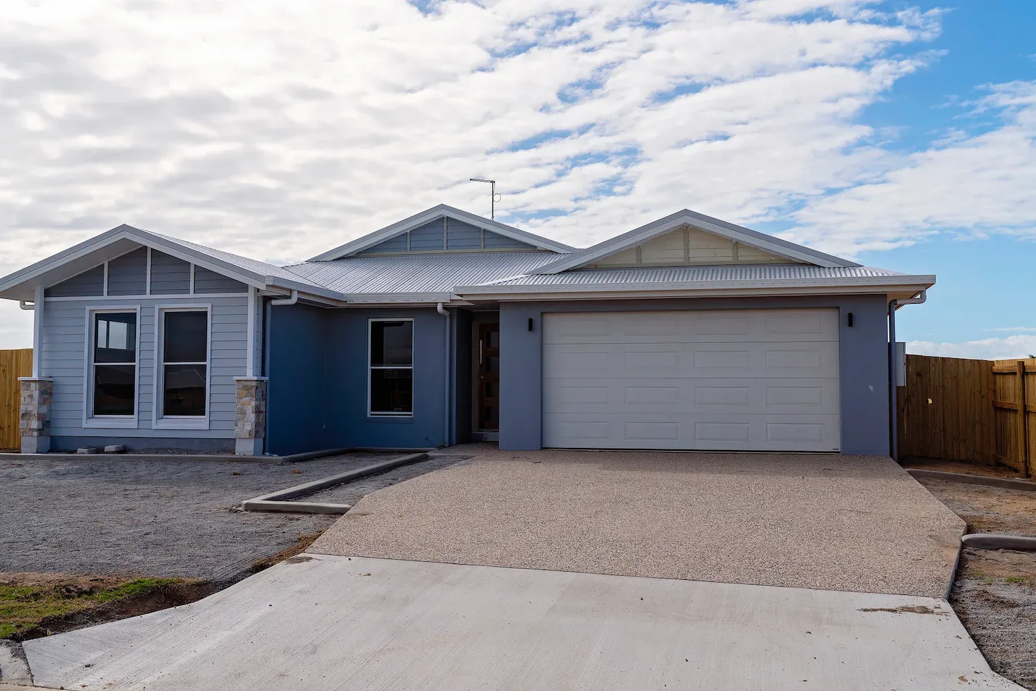 Concrete crossover finished as part of a Redlands driveway