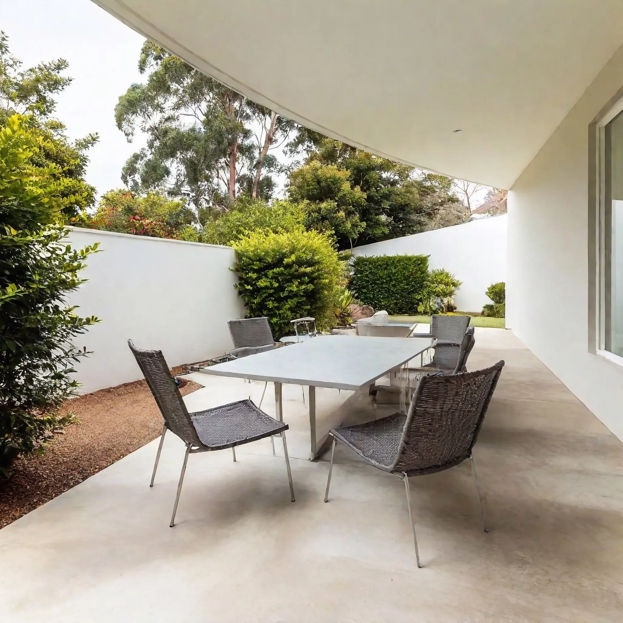 Outdoor concrete patio space for entertaining