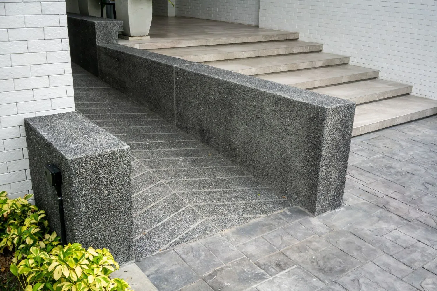 Concrete ramp finished with a non-slip surface for everyday access