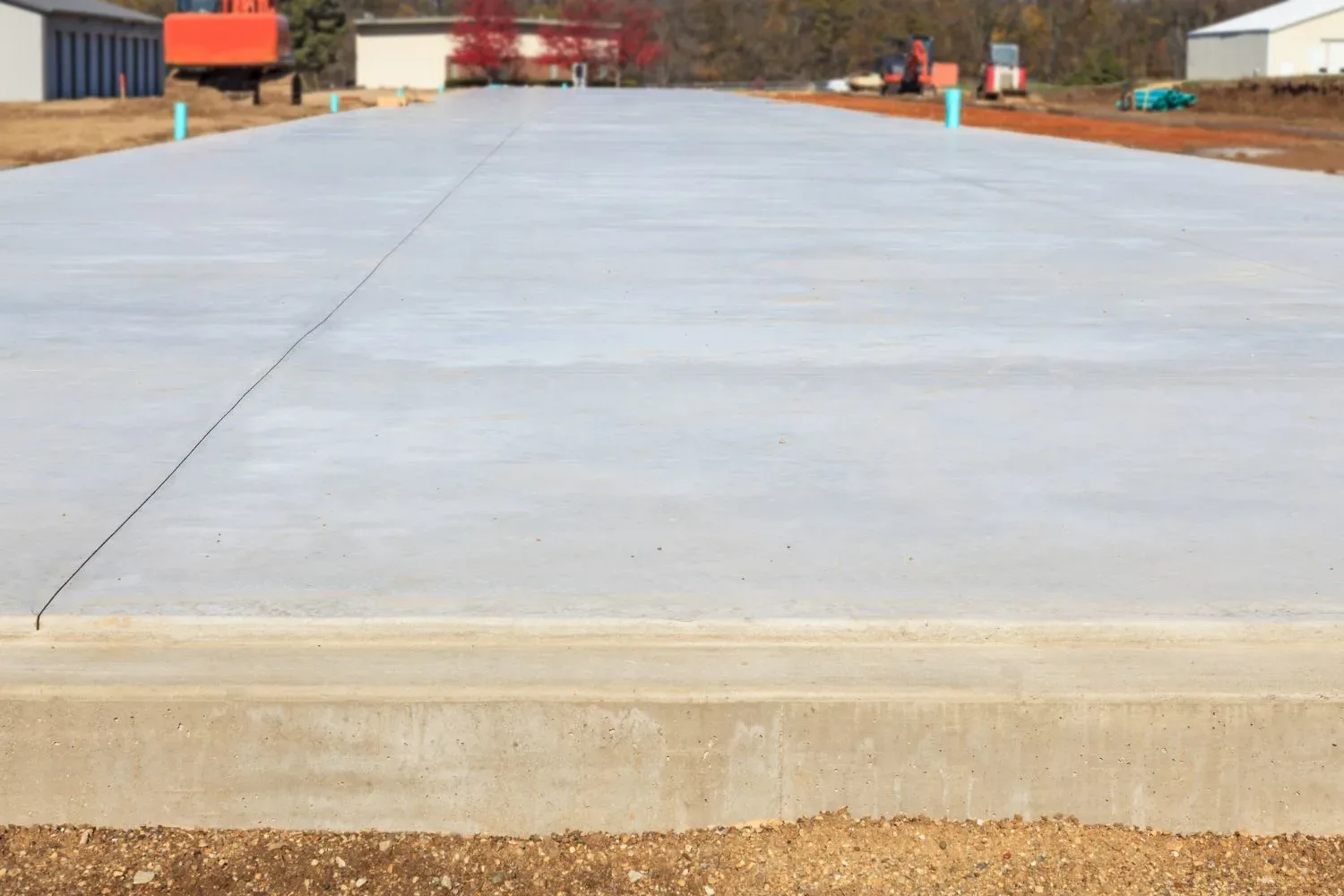 Level, reinforced concrete slab foundation